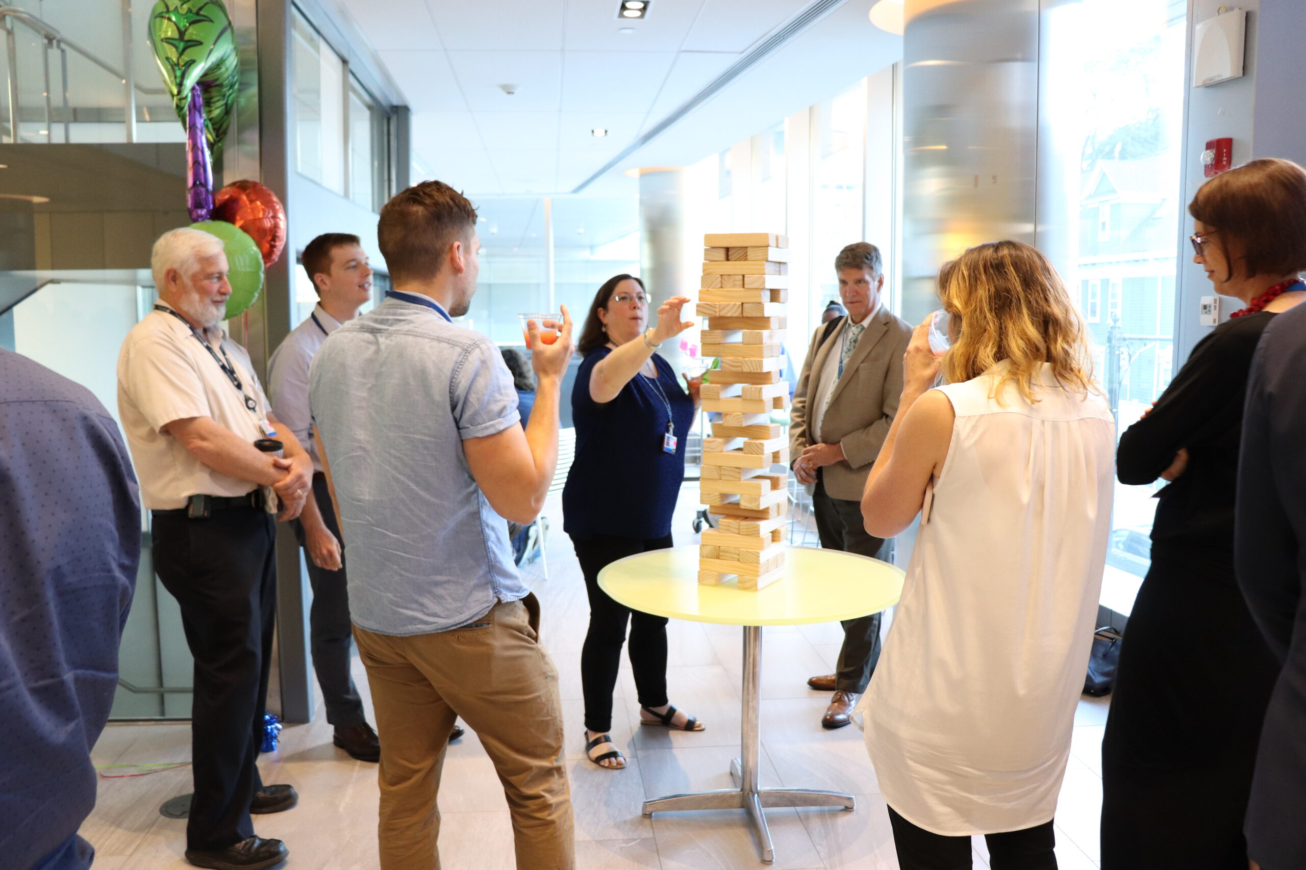 Brigham research staff enjoying a game of jenga at the 2019 event.